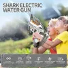 Summer Handheld Shark Water Gun Stor kapacitet Splashing Child Toy Outdoor Electric Water Gun Kids Beach Swing Pool Spela Game 240507