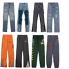 Męski projektant dżinsów dżinsów dżinsowe spodnie dla kobiet i mężczyzn Retro High Street Dżinsy Splashed Ink Graffiti Montage Street Wear Unisex Dżinsy Pantie Rozmiar S-XLG908