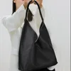 Abendtaschen Schwarze Modesfrau geflochtene Griff Hobo Einfacher Stil Echtes Lederumbeltasche Damen Casual Design Achsel 2024