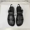 Die Reihe der * Reihen neue echte Leder gewebte Sandalen Frauen Freizeit Mode vielseitig Baotou flache Caligae Schuhe