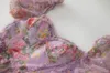 Robe lambrissée à imprimé floral violet d'été