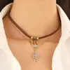 Eight-pointed star choker necklace brown leather necklace for women Niche Maillard Sun double-layer clavicle chain