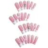 Faux ongles 24pcs Français Faux Nails avec conception de baissement de fleurs 3D