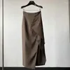 Röcke Design inspirierter Wrap Style Slanted Button Anzug Rock für Frauen im Frühjahr 2024 Unregelmäßige geteilte Hochtüfte