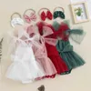 Rompers babymeisjes prinses bodysuits kleden vaste kleur tie knoop knoop suspender tule tutu verjaardagsfeestje meisje bodysuits+hoofdband h240507