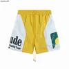 RHUDE High End Designer Shorts för Chaopai Sunset Letter Printing Casual Sports Shorts Mens and Womens Contrast Beach Capris med 1: 1 Original Etiketter