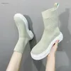 Bottes Flying tissées Chaussures Chaussures Femmes Sumoue à semelle épaisse Tube court 2024 Fashion Elastic Casual Confortable