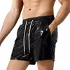 Pantalon court des shorts masculins