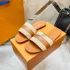 24SS Mulheres chinelas sandálias travam -se de malha plana Círculo de ouro Goll Slipper ao ar livre Designer de luxo de luxo de ladas de praia piscina slides sandália 5.7 03