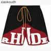 Rhude High End Designer Shorts pour shorts de mode pour hommes Spring and Summer Couleur Blocking Localisation Pantalon d'entraînement de basket-ball sportif de grande taille avec hommes avec 1: 1 étiquette originale