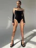 Bodysuit kvinnor sexig transparent turtleneck festivaler kläder mesh topp långärmad tees kvinna dräkt se genom leotard 240423