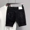 Heren shorts knop ritssluiting taille shorts modieuze heren denim shorts met gescheurde patch werkzakken knie lengte modieuze zomerstraat kledingl2405