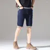 Short masculin Le hipster d'été vintage déchirant denim hommes mince pantalon coréen de cinq quarts