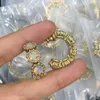 Letra de jóia de designer de marca de luxo ouvido garanhão titânio aço de alta qualidade embutido brinco de cristal mulheres banhadas de ouro jóias de casamento de natal