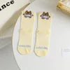 Chaussettes de femmes Softs Soft's Brepinable Japanese Cotton Middle Tube Tube Flower Cartoon Party