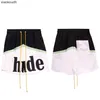 Shorts de créateurs haut de gamme Rhude For New Trendy Alphabet Colored Sports and Leisure Shorts pour hommes et femmes Pantalon de plage imprimé en été High Street avec des étiquettes originales de 1: 1