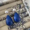 Boucles d'oreilles en peluche vintage en forme de larme bleue premium pour les femmes