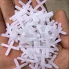 Alfombras CNBTR 500 Piezas Azulejos de cerámica Los espaciadores de nivelador de plástico cuña 1/8 pulgadas de ancho blanco