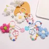 Schlüsselanhänger Lanyards Cartoon Wolle gestrickte Blumen Schlüsselketten Perlen Armband Lanyard Armband Keyring für Frauen Girl Bag Anhänger Charms Schlüsselbund Geschenk