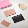 Luxury Femme's Purse's Madras Goat Leather Card Clip de concepteur LETTER LOCT LETTRE CHAMP Sac à changement avec boîte 226L