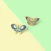 Spille 2 pezzi blu fumetti in lega di farfalla Spettame personalizzate Pin per zaini