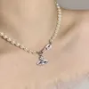 Высокая версия Empress Dowager Saturn Collece Женское жемчужное ожерелье ниша мини -интернет -знаменитость полная бриллиантовая ожерелье