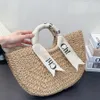 Sac de plage en fourre de paille Raffias Basket Woody Basket Designer Sac de luxe Crochet Shop Shop Shop Backet Crost Cross Cross Bowt Bowknot Picnic Fashion Sac Femmes