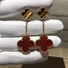 Boucles d'oreilles personnelles Musthave pour les fêtes New and Higher Gold Flower Flowerfly Four Leaf Clover Womens 18K Rose Anti With Common Vanly