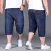 Grande taille 2848 50 jeans shorts en jean pour hommes 150 kg lâches d'été mince gras faste moelle de mode de mode à cinq longs pantalons 240423