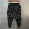 Męskie spodnie 2023 Nowy letni trend mody koreańsko -mody swobodny wysoki pasek kieszonkowy elastyczne męskie męskie legita legańskie przycięte spodnie T240507