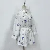 Designer's two-piece linen material lapel long sleeved set with starry moon embroidery casual set, shirt and widened leg shorts set