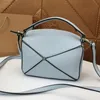 レディースデザイナーハンドバッグバッグ用ピンクパズルトートバッグ高品質の本物のレザークロスボディバッグパズルズ幾何学的パターン豪華なショルダーバッグクラシックコントラスト