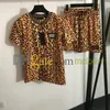Leopardenrock Set Modedruck Kurzarm T -Shirt Elastic Taille Mini Kleider für Frauen Sommer Punk zweiteilige Kleid
