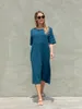 Robes de fête Femmes Elegant Lounge Slip A-Line Long Robe Couleur continue Couleur courte à manches courtes pour la plage Streetwear