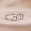 Bagues de mariage skyrim minimalistes trois coeurs allonges de mariage en acier inoxydable amour anneaux décontractés famit gift 2024 bijoux tendance en gros en gros