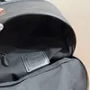 Mochila de saco de la moda bolso escolar de diseñador para hombre bolsas de libros de alta capacidad bolsas de viaje de cuero luxurys bolso de mano para hombres mochilas de gimnasio