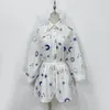 Designer's two-piece linen material lapel long sleeved set with starry moon embroidery casual set, shirt and widened leg shorts set