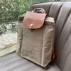 Sac à dos de sac à dos en nylon en cuir de luxe Bagure de sac à dos en nylon sac à dos classique sac à dos brodé de sacs de livre en nylon