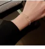 Brand Super étincelant délicat délicat Bracelet pendentif à fleurs de perle délicate pour les femmes