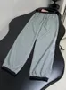 Frauenhose Mode Silky Jogging für Frauen 2024 Hochwertige Reißverschluss-Pocket Grey Patchwork Elastic Taille Faden Beine Hosen Lady Lady