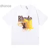 Mężczyznę i kobiety projektantka moda Rhude gradientowy kolor ptaków drukarnia Krótkie rękawki T-shirt dla mężczyzn Women High Street Loose Half-Sleeved Shirt