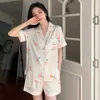 Salon de sommeil pour femmes fausses soie femme fleur pyjamas pyjamas set bouton en haut short 2 pièces set satin nightwear woungewear pour les vêtements de sommeil d'été Corée