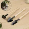 Manuel pelle de jardinage poignée en bois mini outils de métal plantes râteau râteau pour fleurs plante en pot 3 pcs / gouttes de set livraison du jardin à la maison pat oted8