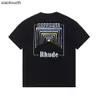Rhude High -End -Designer -Kleidung für Modemikro -Logo Regenbogenquadratkreis gedruckt kurzärmeliges T -Shirt für Männer und Frauen High Street Lose halb Ärmeln mit 1: 1 Logo