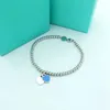 Chaîne Love Enamel T Famille Bracelet de perle ronde argent pur avec un cadeau de mode haut de gamme classique en forme de cœur pour les femmes Q240507