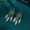 Charm New Bohemian style turquoise feather hollow earrings and earrings