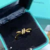 Anillos de banda v anillo de nudos retorcidos de oro T Home Diamond Womens 18K Rose Rope Propuesta de champán Q240507