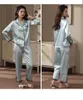 Women's Sleep Lounge 2024 NY SIMULATERAD SILK PASE KVINNA PAJAMAS Tvådelar Set Long Female House Lounge Spring Autumn Elegant Colst Solid Sleepwear