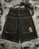 Amerikaanse Y2K retro cartoonpatroon denim shorts losse hiphop jogger heren mode zwart basketbal zweetwapen 240423