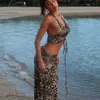 Tvådelt klänning Leopardtryck strandkjol set kvinnor sexig grimma skörd och maxi kjol kläder sommar ihåliga ut semester två bit set 2024 y240508